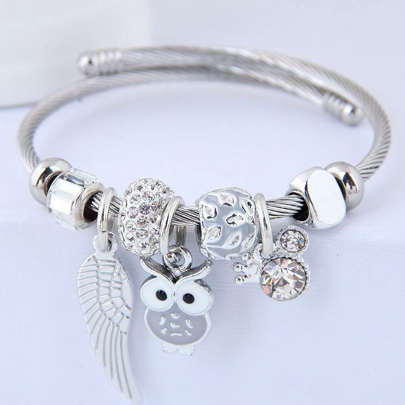 Bracciale in acciaio inossidabile con ciondolo a forma di gufo con perline e ali d'angelo