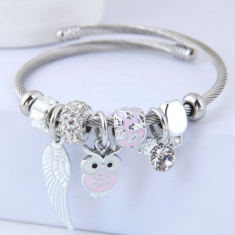 Bracciale in acciaio inossidabile con ciondolo a forma di gufo con perline e ali d'angelo